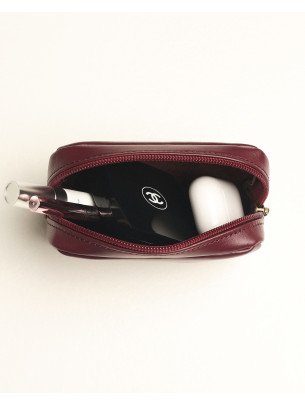 Шкіряна міні-косметичка у лімітованому бордовому