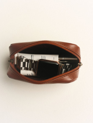 Шкіряна міні-косметичка у лімітованому коньячному Шкіряна міні-косметичка у лімітованому коньячному